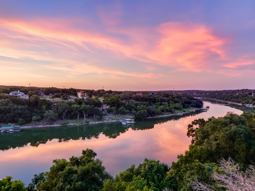 Situated on the Pedernales River arm of Lake Travis on over 8 acres of prime Texas Hill Country, this sprawling single story home offers the very best of waterfront and Hill Country living.