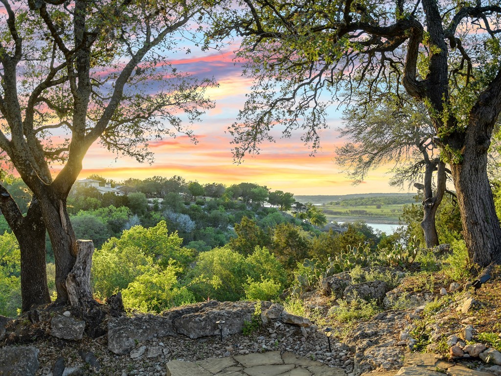 Nestled on 1.5 private acres and backing to a quiet cove, this charming home blends lake flair with full functionality and is a true outdoor oasis. What a great opportunity to live Lake Travis and enjoy the peaceful Texas Hill Country!