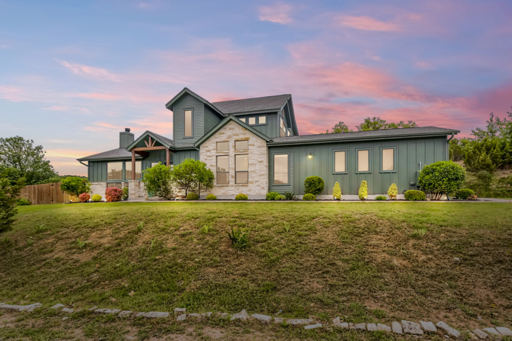 Perched on a hilltop and sprawled across .65 of an acre, this stunning custom blends clean contemporary lines with vintage farmhouse touches. The distinctive character of Central Texas is reflected in the perfect fusion of nature & architectural flair.